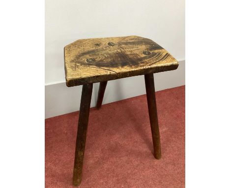 A XIX Century Elm Three Legged Cutler's Stool, 57cm high.