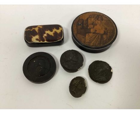 An Early XIX Century Papier Maché Circular Snuff Box, the lid transfer printed with a couple beside a tree, 8cm diameter; a r