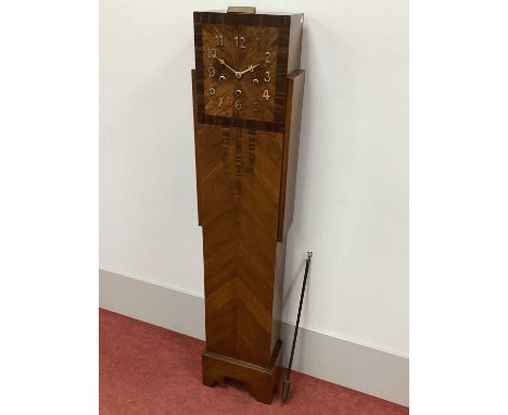 A 1930's Art Deco Walnut Grandmother Clock, with a crossbanded surround to the square dial with applied gilded brass Arabic n