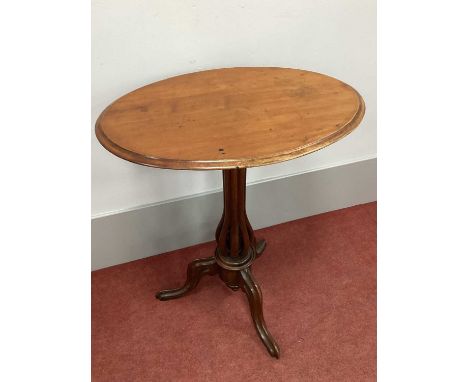 A XIX Century Mahogany Pedestal Table, with oval top, moulded edge and shaped pedestal on cabriole legs, 72cm high.