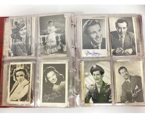 An Album of Vintage Photographs of Stars of Stage and Screen, some signed (unverified) to include:- Stan Laurel and Oliver Ha