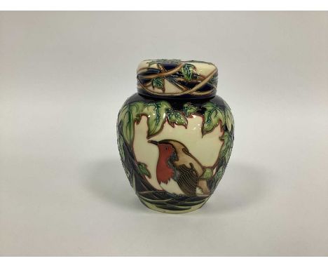 A Moorcroft Pottery Ginger Jar and Cover, painted in the 'Robin' design by Philip Gibson, limited edition No 28/75, signed, p