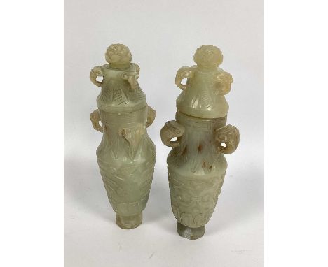 A Pair of XVIII Century Carved Green Hardstone Vases and Covers, with ram mask handles and scrolling and leaf decoration, 19c