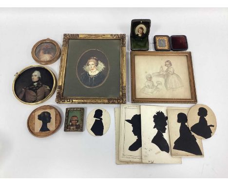 A Silhouette of a Young Lady, mounted in a turned treen box, 8.5cm diameter; a daguerreotype of a gentleman, in a leather cas