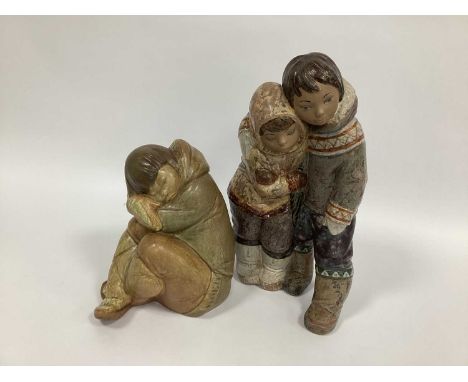 A Lladro Gres Group 'Eskimo Boy and Girl', model number 2038 by Juan Huerta, printed and incised marks, 38cm high and another