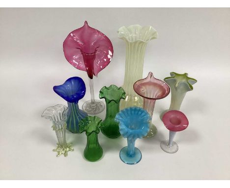 A Late XIX Century Cranberry Glass Jack in the Pulpit Vase, raised on tall clear stem and circular foot with star base, 33cm 