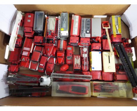 Diecast - A quantity of predominantly unboxed diecast and plastic models of fire appliances to include Welly, Solido, Siku an