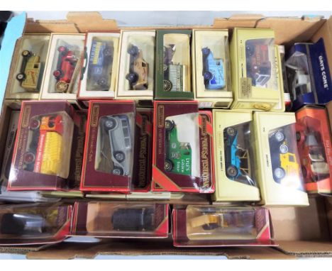 Thirty diecast model motor vehicles comprising 14 Matchbox Models of Yesteryear and 16 Days Gone, Lledo, all appear mint in o