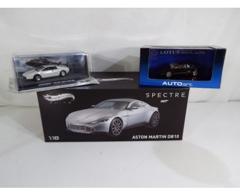 Diecast models - a Hot Wheels Elite Spectre 007 1:18 scale diecast Aston Martin DB10, a Lotus Esprit The Spy Who Loved Me, a 