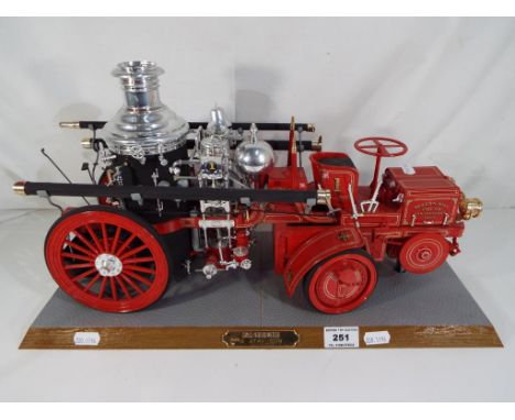 Airfix - A completed Airfix model of the 1911 Christie steam powered fire engine on plinth.