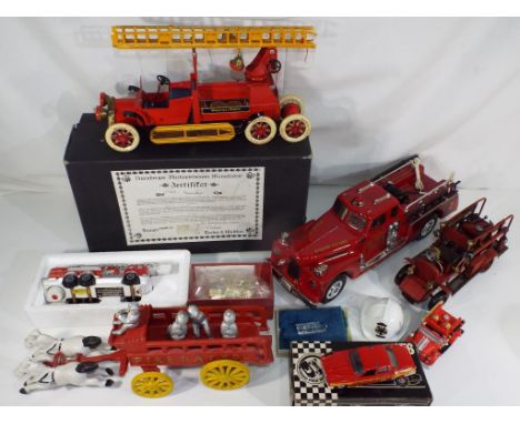 Solido and others - Ten cast iron, pottery and diecast fire vehicles in original boxes, includes a Grand Prix model which is 