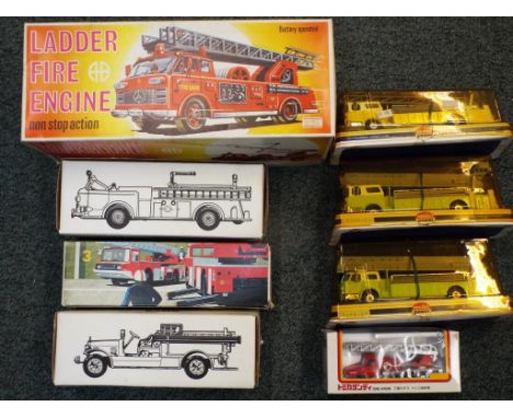 ERTL & others - 8 die cast and plastic Fire vehicles in original boxes, comprising 3x Model Power, 2x ERTL money boxes, Tomic