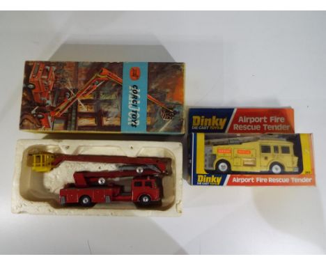 Lot to include a Dinky Toys # 263 Airport Fire Rescue Tender contained in original window box. Model appears VG, box G. Also 
