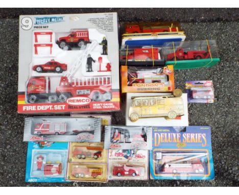 Schuco,Solido & others - 14 die cast Fire vehicles in original boxes / blister packs, comprising Schuco ref 21865, 21703, Sol