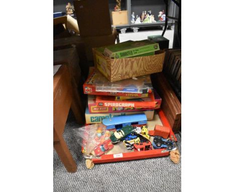 An assorted collection of vintage games, toys, and diecast, to include boxed Subbuteo football teams, board games including S