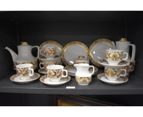 A mid 20th Century Bavarian Eschenbach lustre coffee and tea service, comprising five teacups, eight saucers, a lidded sucrie