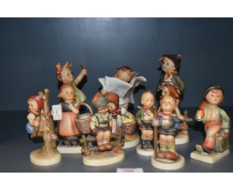 A group of 10 West German Hummel porcelain ornaments, the largest measuring 14cm tall