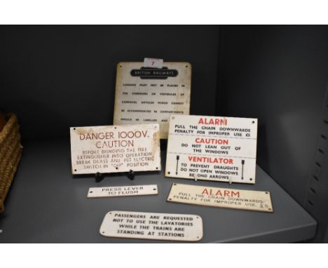 Six vintage plastic railway and other signs, to include a British Railways Luggage sign and two lavatory signs