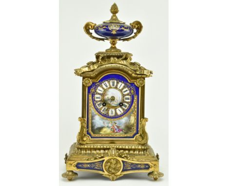 A French 19th century Japy Freres, Paris gilt metal &amp; enamel mantle clock. The clock having a hand painted 8 day movement