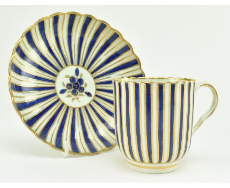 A late 18th century circa 1790 believed Caughley porcelain teacup and saucer. The teacup and saucer decorated in cobalt and g