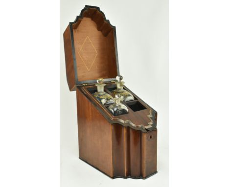 A 19th century George III mahogany and box wood inlaid decanter box. The mahogany case having a hinged top with baize lined i