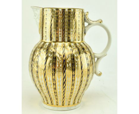 A mid-late 18th century c1770s First (Wall) Period Worcester porcelain mask cabbage jug. The mask jug heavily gilded on cobal