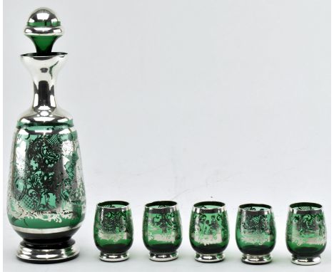 A set of Venetian emerald glass decanter and glasses&nbsp;with silver overlay.&nbsp;Comprises a decanter with its original st