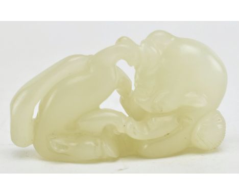 A Chinese white jade&nbsp;Double Badgers pendant, carved with two feline-like badgers. Theanimals reclining together gazing a