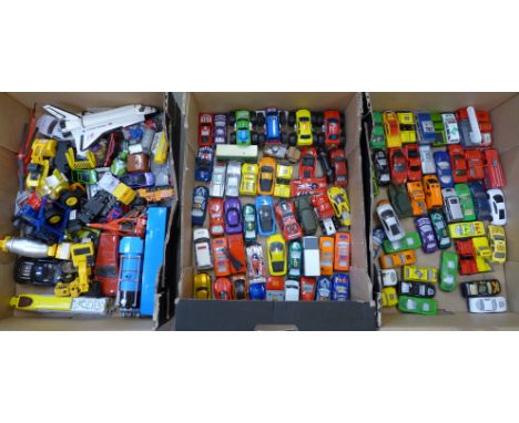 A collection of die-cast model vehicles, in three boxes 