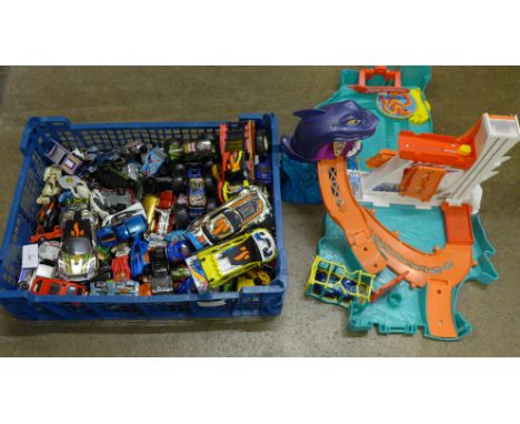 Approximately 120 Hot Wheels model vehicles and a Hot Wheels set 