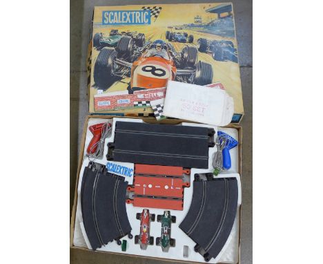 A Scalextric Grand Prix 50 Set model motor racing game, boxed 