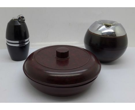 A Poppell table lighter, a Bakelite ashtray and a Bakelite lidded pot 