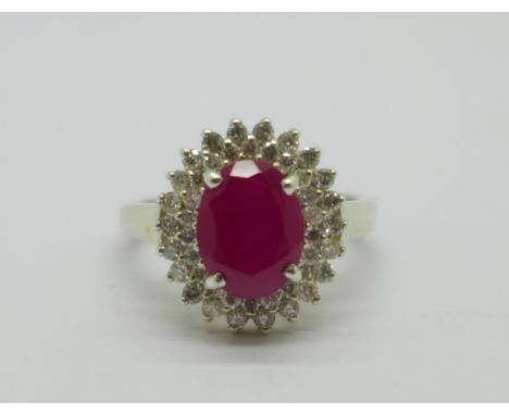 A 14ct white gold, ruby and diamond ring, 3.4g, O 