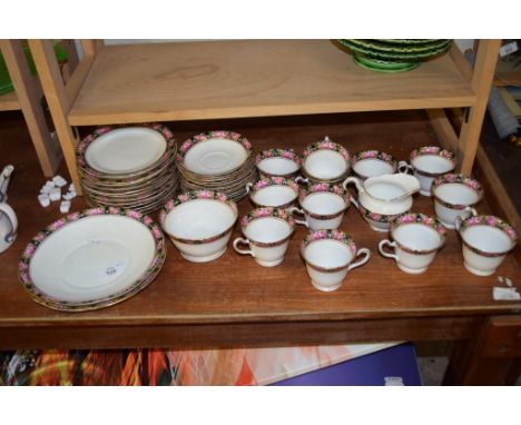 PART POTTERY TEA SERVICE WITH ROSE BORDER