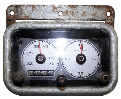A Halda Speedmaster Pilot Rally Timer, circa 1960's serial number 20147, with dash mounting bracket and cable, used in a 1966