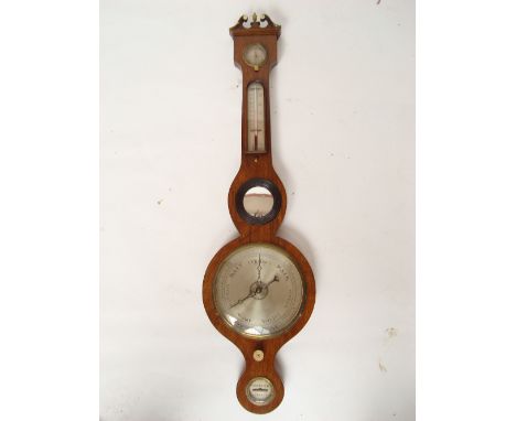 An early 19th Century simulated rosewood wheel barometer, with 8 dial silvered dial convex mirror, thermometer, dry/damp scal