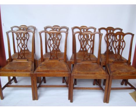 A set of eight late 19th/early 20th Century George III style Chippendale design mahogany dining chairs, each with shaped and 