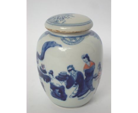 A Chinese blue and white tea caddy and cover, of ovoid form decorated with figures in a landscape (cover poss associated), si