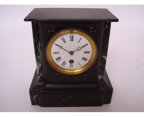 A Victorian black slate and marble mantel clock, with eight day brass cylinder movement, white enamel dial with Roman numeral