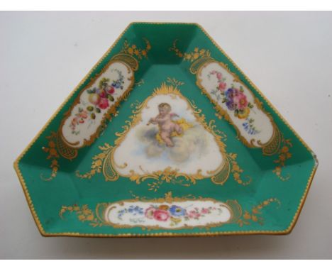 A late 18th Century Sevres triangular tray, decoration possibly later, green ground, the centre painted with a vignette of a 