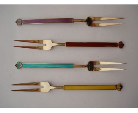 David Anderson silver gilt and enamel, four pickle forks. 
