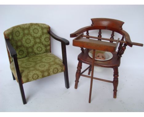 An early 20th Century bow back childs commode chair (potty repaired) with tray and rail together with a 1930's upholstered ch