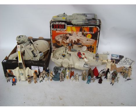 Vintage Star Wars vehicles and figures comprising Millennium Falcon in original box, Rebel transport ship, Rebel Armored Snow