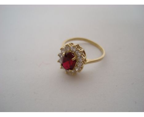 A 14ct gold ruby and diamond ring. 