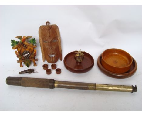 A treen nut bowl with brass capstan nut cracker, made from timber and brass from H. M. S Andromeda, a brass and wood two draw