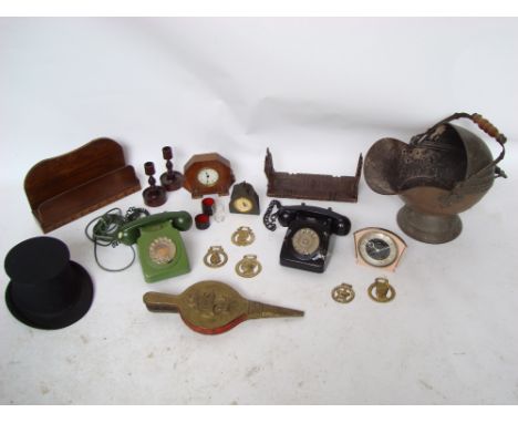 A mixed lot to include a brass helmet coal scuttle, bellows, collapsible opera hat, Black Forest book slide carved with edelw