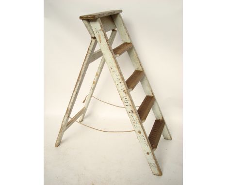 A wooden step ladder. 