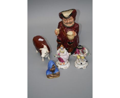 A Royal Worcester Othello candle snuffer, a Beswick Hereford cow, a Royal Doulton Sir John Falstaff character jug and a pair 