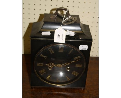 A mid 20th century Smith's mantel clock, the ebonised case enclosing a gong striking eight-day movement faced by Arabic dial,