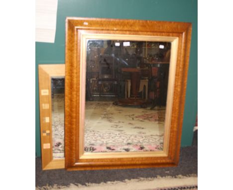 A 19th century satinwood cushion moulded wall mirror with later glass, 106 x 83cm together with a contemporary satinwood mirr